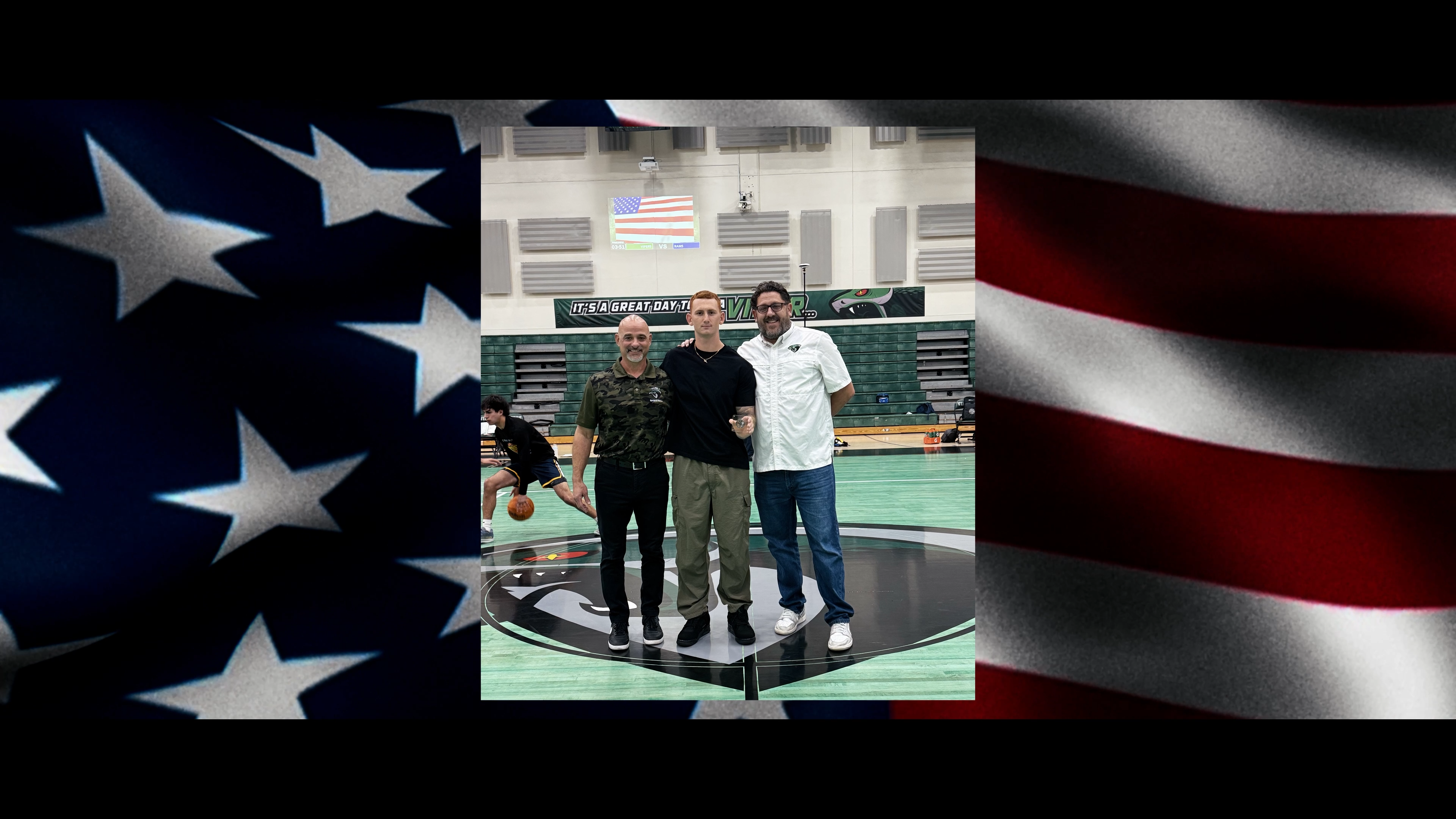 Felix Varela honors a U.S. Marine at a high school basketball game